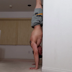 Handstandpushup.com Handstand Push-Up Guide Homepage Image 10 Handstand facing wall