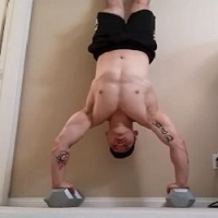 Handstandpushup.com Bent arm handstand press related exercise strict handstand push-up on dumbbells