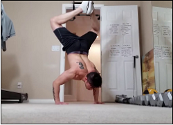 handstandpushup.com 90 degree handstand push-up bent knees combination black shorts